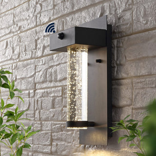 Tremillo 5.5" Minimalist Industrial Iron/Glass Seeded Glass with Dusk-to-Dawn Sensor Integrated LED Outdoor Sconce