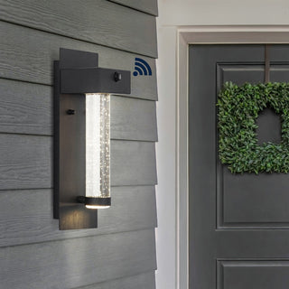 Tremillo 5.5" Minimalist Industrial Iron/Glass Seeded Glass with Dusk-to-Dawn Sensor Integrated LED Outdoor Sconce