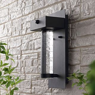 Tremillo 5.5" Minimalist Industrial Iron/Glass Seeded Glass with Dusk-to-Dawn Sensor Integrated LED Outdoor Sconce