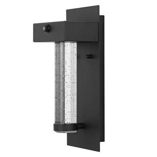 Tremillo 5.5" Minimalist Industrial Iron/Glass Seeded Glass with Dusk-to-Dawn Sensor Integrated LED Outdoor Sconce