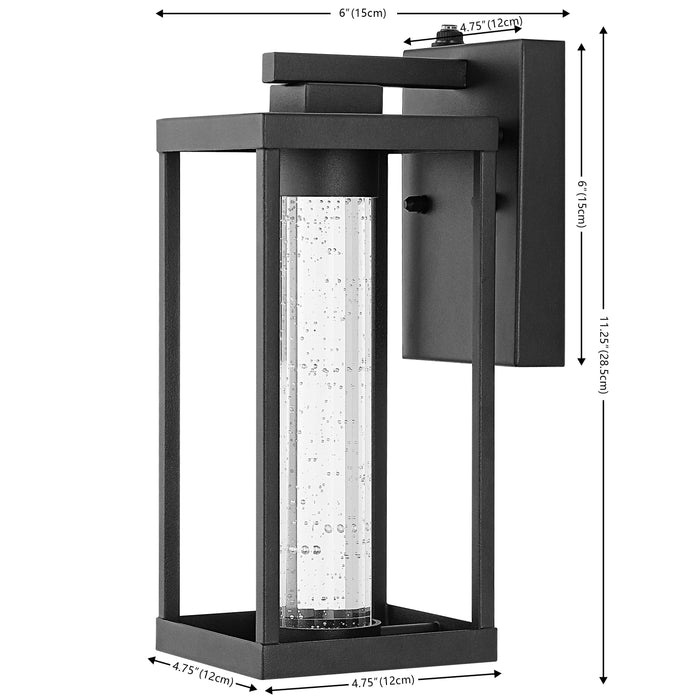 Shoji 4.75" Industrial Vintage Iron/Glass Seeded Glass with Dusk-to-Dawn Sensor Integrated LED Outdoor Sconce