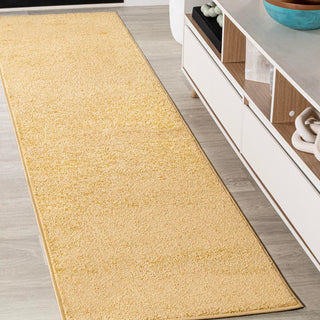 Trivor Haze Solid Low-Pile Area Rug Mustard