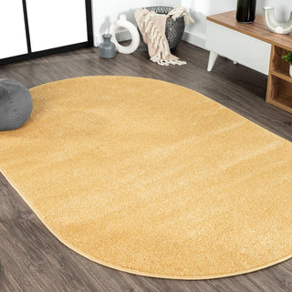 Trivor Haze Solid Low-Pile Area Rug Mustard