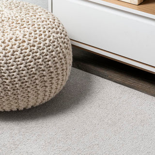 Trivor Haze Solid Low-Pile Area Rug Ivory