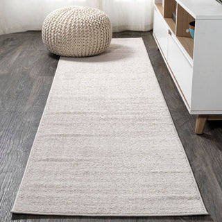 Trivor Haze Solid Low-Pile Area Rug Ivory