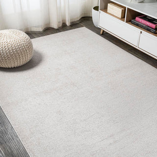 Trivor Haze Solid Low-Pile Area Rug Ivory