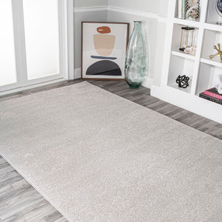 Trivor Haze Solid Low-Pile Area Rug Ivory