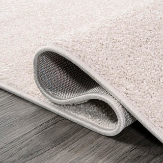 Trivor Haze Solid Low-Pile Area Rug Ivory