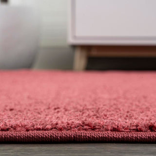 Trivor Haze Solid Low-Pile Area Rug Red