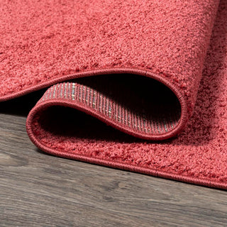 Trivor Haze Solid Low-Pile Area Rug Red