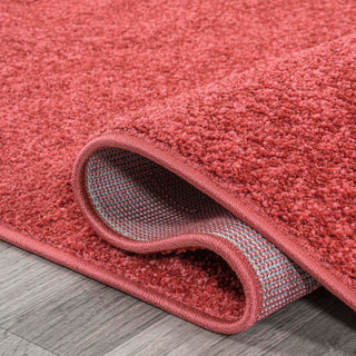 Trivor Haze Solid Low-Pile Area Rug Red