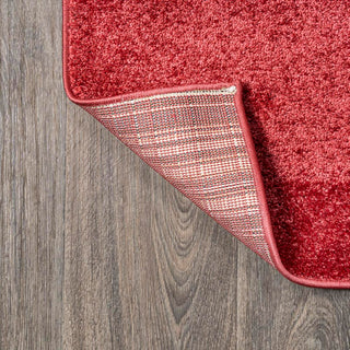 Trivor Haze Solid Low-Pile Area Rug Red