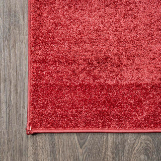 Trivor Haze Solid Low-Pile Area Rug Red