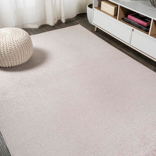 Trivor Haze Solid Low-Pile Area Rug Beige