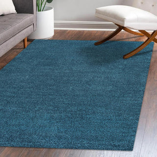 Trivor Haze Solid Low-Pile Area Rug Turquoise