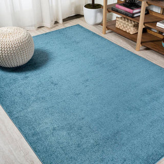 Trivor Haze Solid Low-Pile Area Rug Turquoise