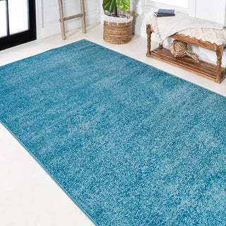 Trivor Haze Solid Low-Pile Area Rug Turquoise