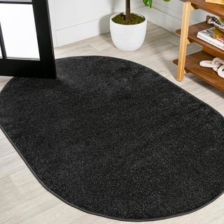 Trivor Haze Solid Low-Pile Area Rug Black