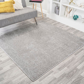 Trivor Haze Solid Low-Pile Area Rug Light Gray