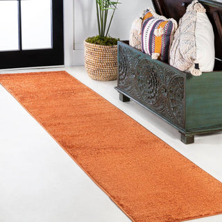 Trivor Haze Solid Low-pile Area Rug Orange