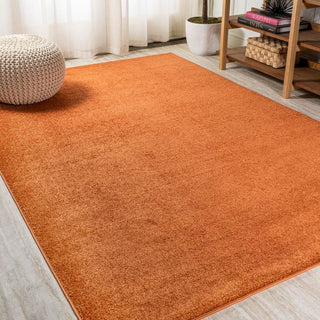 Trivor Haze Solid Low-pile Area Rug Orange