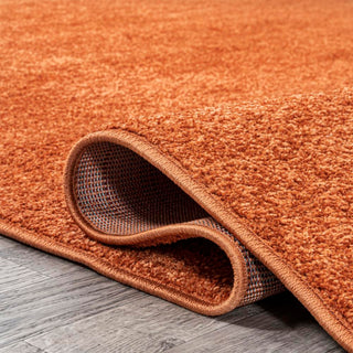 Trivor Haze Solid Low-pile Area Rug Orange