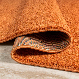 Trivor Haze Solid Low-pile Area Rug Orange