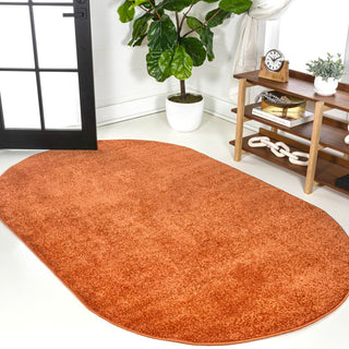 Trivor Haze Solid Low-pile Area Rug Orange