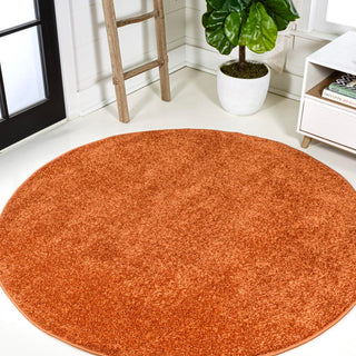 Trivor Haze Solid Low-pile Area Rug Orange