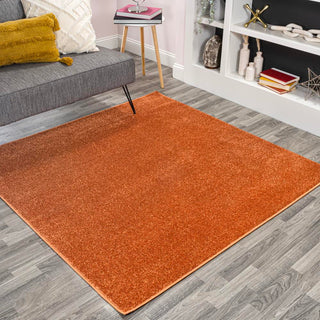 Trivor Haze Solid Low-pile Area Rug Orange