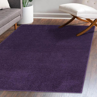 Trivor Haze Solid Low-pile Area Rug Purple