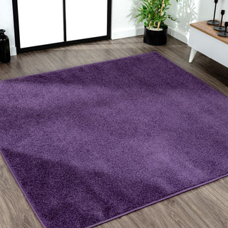 Trivor Haze Solid Low-pile Area Rug Purple