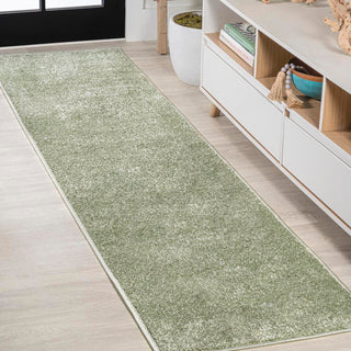 Trivor Haze Solid Low-pile Area Rug Green