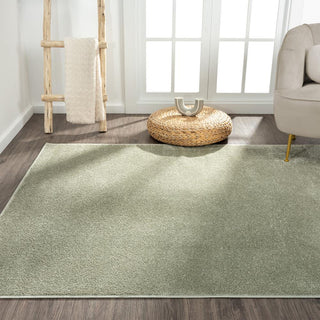 Trivor Haze Solid Low-pile Area Rug Green