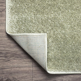 Trivor Haze Solid Low-pile Area Rug Green