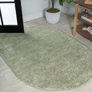 Trivor Haze Solid Low-pile Area Rug Green