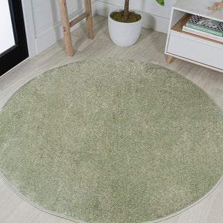 Trivor Haze Solid Low-pile Area Rug Green