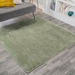 Trivor Haze Solid Low-pile Area Rug Green