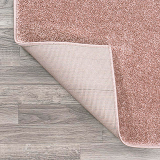 Trivor Haze Solid Low-pile Area Rug Pink