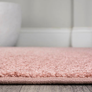 Trivor Haze Solid Low-pile Area Rug Pink