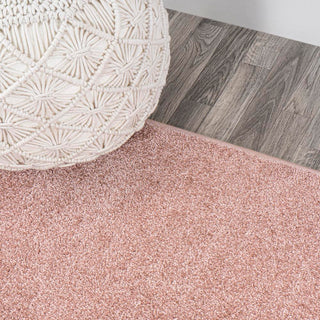 Trivor Haze Solid Low-pile Area Rug Pink