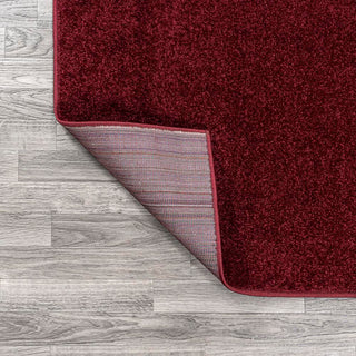 Trivor Haze Solid Low-pile Area Rug Dark Red