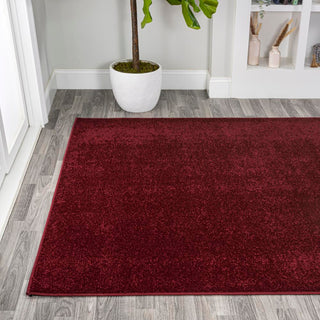 Trivor Haze Solid Low-pile Area Rug Dark Red