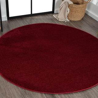 Trivor Haze Solid Low-pile Area Rug Dark Red