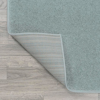 Trivor Haze Solid Low-pile Area Rug Light Blue