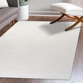 Trivor Haze Solid Low-pile Area Rug Cream