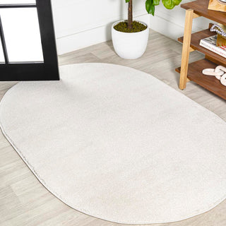 Trivor Haze Solid Low-pile Area Rug Cream