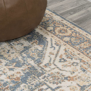 Julita Bold Distressed Medallion Low-Pile Machine-Washable Area Rug