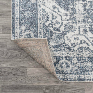 Julita Bold Distressed Medallion Low-Pile Machine-Washable Area Rug